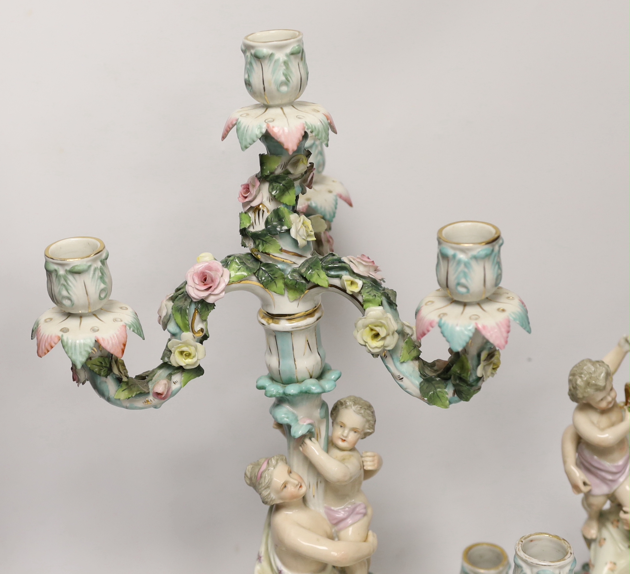 A pair of Sitzendorf figural candelabra, 46cm
